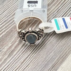 Elegant Silver Ring with Blue Stone